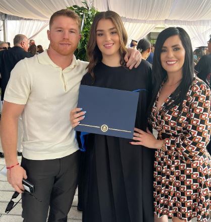 Emily Cinnamon Alvarez with her parents Canelo Alvarez and Karen Beltran on her graduation.